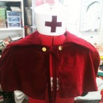 PVC Nurse cap and decadent red velvet cape