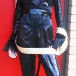 Panther costume with golden leash, fancy dress costume hire shop