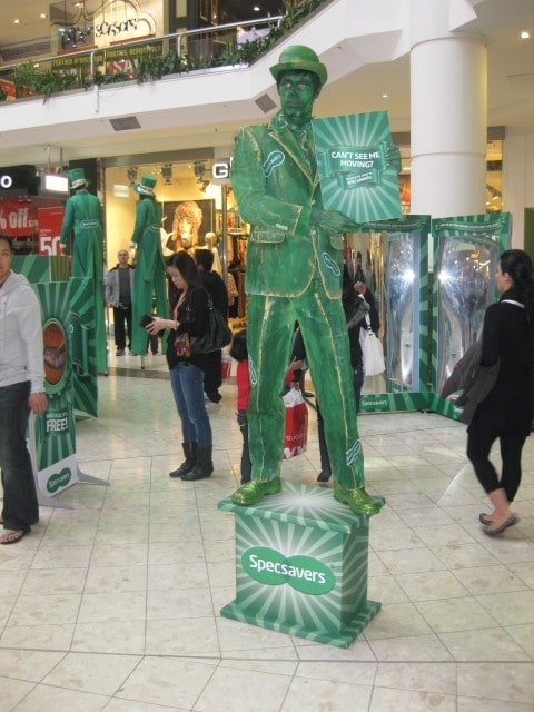 Spec Savers promotional costumes, stilt walkers and living statue